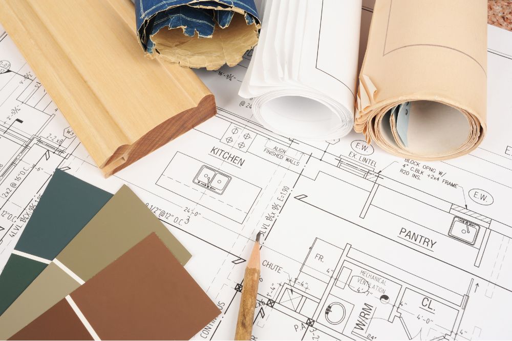Background image, showing a work table covered in tools and construction blueprints
