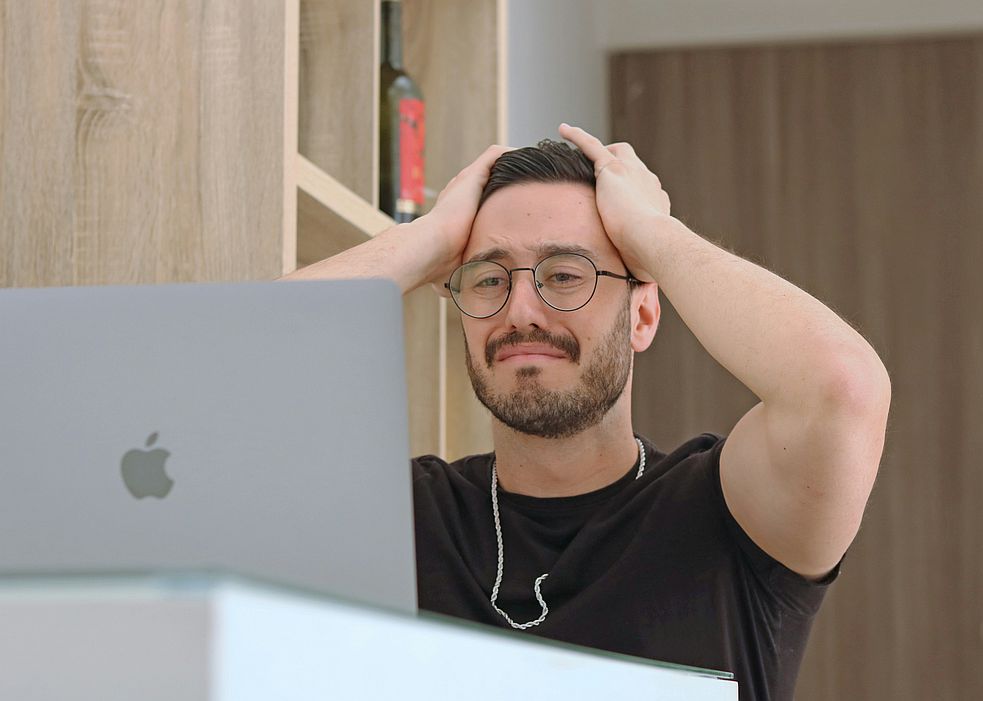 Picture of a person noticing a mistake in their work